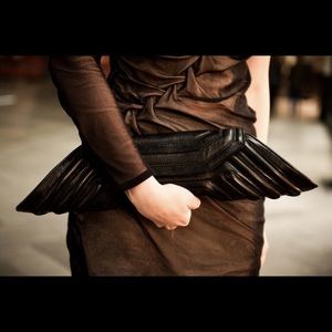 Black leather “Geo” clutch by Bracher Emden London